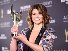 Elise Bauman, the winner of the 2018 Cogeco Audience Choice Award, poses backstage at the Canadian Screen Awards in Toronto on Sunday March 11, 2018.