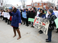 Activists gather outside Queen's University's Grant Hall in Kingston, Ont., to protest a lecture by University of Toronto professor Jordan Peterson on March 5, 2018.