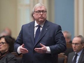 Quebec Health Minister Gaetan Barrette responds to the Opposition during question period in the National Assembly, in Quebec City on Wednesday, March 14, 2018.