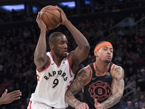 Toronto Raptors forward Serge Ibaka (left) drives to the basket against the New York Knicks on March 11.