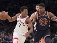 Toronto Raptors guard Kyle Lowry (7) drives to the basket against New York Knicks guard Frank Ntilikina (11) during the first half of an NBA basketball game, Sunday, March 11, 2018, at Madison Square Garden in New York.