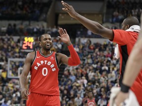 Toronto Raptors' CJ Miles celebrates after hitting a 3-point shot during the second half of their game against the Indiana Pacers on Thursday night in Indianapolis. Toronto won 106-99. (/