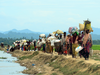 Rohingya refugees who were stranded walk near the no man’s land area between Bangladesh and Myanmar in October 2017.