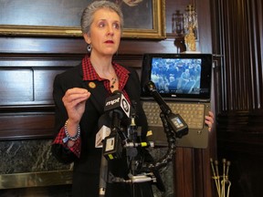 Maryland state Sen. Cheryl Kagan shows security video during a news conference on Tuesday, March 13, 2018 at the Maryland State House in Annapolis, Maryland. She says the video supports her allegations that a lobbyist touched her inappropriately after putting his hand on her back at a tavern earlier this month. The lobbyist is adamantly denying the allegations, saying the video shows he did not touch her inappropriately.