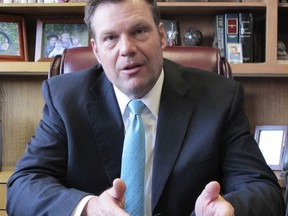 FILE - In this Jan. 4, 2018 photo, Kansas Secretary of State Kris Kobach speaks during an interview in Topeka, Kan. Legal challenges to a Kansas law requiring proof of citizenship to register to vote, will go on trial next week in a case with national implications for voting rights. At issue in a trial that begins Tuesday, March 6, 2018. is the fate of a Kansas law championed by Kansas Secretary of State Kobach. That law requires people to provide citizenship documents such as a birth certificate, naturalization papers or passport at the time they register to vote.