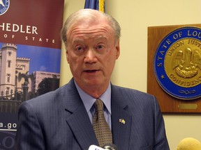 Louisiana Secretary of State Tom Schedler, accused in a lawsuit of sexually harassing one of his employees, speaks at a press conference on Wednesday, March 14, 2018, in Baton Rouge, La. Schedler announced he won't resign from his position, but won't run for re-election next year.