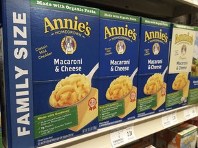 Boxes of Annie's Macaroni & Cheese are shown on the shelf at a supermarket in Edina, Minn., Sunday, March 4, 2018. Annie's is an organic and natural unit of food industry giant General Mills, which announced a deal Tuesday to create a 34,000-acre organic farm in South Dakota to supply it with organic wheat that will become pasta for the popular product.