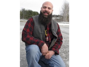 In this Thursday, March 21, 2018 photo, Steve Jalbert poses in Berlin, Vt., with the beard he plans to enter in the Make-a-Wish fund-raising contest on Saturday, March 24, 2018 in Burlington, Vt. Jalbert said he was encouraged to enter the contest by people who admired his beard. One of the judges will be Jonathan Goldsmith, the actor best know as the "Most Interesting Man in the World" of the Dos Equis beer commercials.