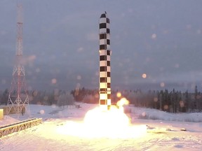 Russia's new Sarmat intercontinental ballistic missile blasts off during a test launch from an undisclosed location in Russia.