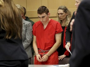 This Feb. 19, 2018 file photo shows Nikolas Cruz appearing in court for a status hearing before Broward Circuit Judge Elizabeth Scherer in Fort Lauderdale, Fla., Florida.