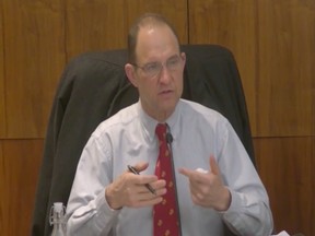 Dennis Alexander is seen here in a screen grab from a Seaside City Council meeting on Feb. 15. Via  via AMP Media.