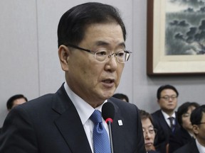 In this Feb. 21, 2018, photo, South Korea's national security director Chung Eui-yong speaks at the National Assembly in Seoul, South Korea. President Moon Jae-in will send a delegation led by Chung to North Korea on Monday, March 5, 2018, for talks on how to ease nuclear tensions and help arrange the restart of dialogue between Pyongyang and Washington, officials said Sunday.