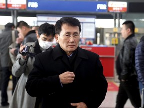 Choe Kang Il, a senior North Korean diplomat handling North American affairs, is seen at the Beijing Capital International Airport in Beijing Sunday, March 18, 2018. Cho is heading to Finland for talks with the U.S. and South Korea.