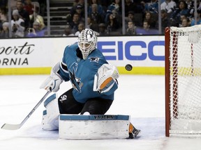 San Jose Sharks goaltender Martin Jones stops a shot during the first period of an NHL hockey game against the Vegas Golden Knights on Thursday, March 22, 2018, in San Jose, Calif.