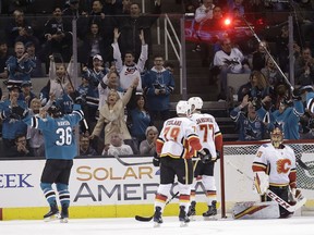 San Jose Sharks' Jannik Hansen (36) celebrates after scoring against the Calgary Flames during the first period of an NHL hockey game Saturday, March 24, 2018, in San Jose, Calif.