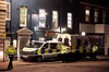 Police outside the Zizzi restaurant in Salisbury, England, Tuesday, March 6, 2018 near where former Russian double agent Sergei Skripal was found critically ill.