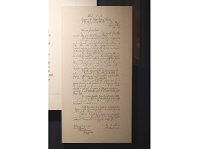 In this March 22, 2018, photo, a letter written by U.S. President Abraham Lincoln in 1862 replying to Thailand's King Mongkut is on display at the exhibition "Great and Good Friends," inside Grand Palace Bangkok, Thailand.  Lincoln, likely bemused and relieved at the distraction from America's then-raging Civil War, politely declined Mongut's offer to send a pair of elephants as a gift to the United States, saying his country uses the steam engine and would have no use for the working animals.
