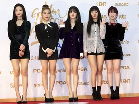 In this Jan. 10, 2018, photo, South Korean popular girl band Red Velvet poses for photographers during the 32nd Golden Disc Awards in Goyang, South Korea.