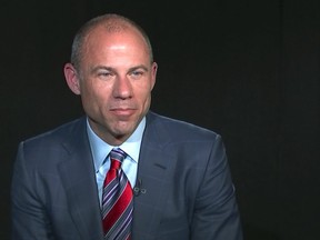 Michael Avenatti, attorney and spokesperson for adult film star Stormy Daniels, listens to a reporter's question during an interview at The Associated Press, Wednesday, March 21, 2018, in New York.