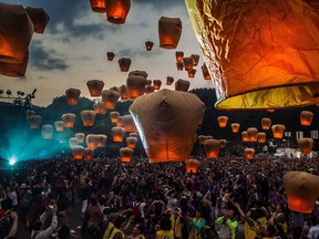 Tourists release sky lanterns during a festival in Pingxi, Taiwan, on March 2, 2018.
