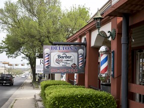 The barber shop where Mark Conditt, the Austin serial bomber, occasionally got his hair cut, in Pflugerville, Texas, March 24, 2018. Conditt’s first victim got his hair cut at Delton’s, too, but what to make of this fact is not readily apparent as authorities struggle to find a motive for the attacks and the shop owner reportedly ascribes the common patronage to coincidence.