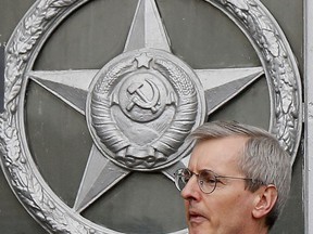 British ambassador to Russia, Laurie Bristow, leaves after a meeting at the Russian foreign ministry in Moscow,Tuesday March 13, 2018. Russia will only cooperate with Britain on the investigation into last week's poisoning of an ex-Russian spy Sergei Skripal and his daughter Yulia if it receives samples of the nerve agent that is believed to have been used, Russia's foreign minister Lavrov said Tuesday.