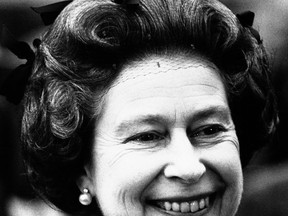 This Jan. 1981 photo shows Queen Elizabeth II, an informal portrait taken at the Chelsea Flower Showin in London.  A troubled teenager who wanted to assassinate Queen Elizabeth II during her 1981 visit to New Zealand fired a shot near her motorcade, newly released documents show. New Zealand's internal spy agency the Security Intelligence Service released the previously classified documents to the news website Stuff, shedding new light on the historic incident. (AP Photo/File)