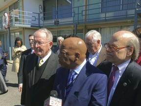 U.S. Rep. John Lewis (D-Ga.), center, speaks while touring the Lorraine Hotel with other Members of Congress in Memphis, Tenn., Friday, March 2, 2018. Next to Lewis is U.S Senator Lamar Alexander (R-Tenn.), left and U.S. Rep. Steve Cohen (D-Tenn.).  Rev. Martin Luther King was assassinated at the hotel on April 4, 1968. Members of Congress are on a three-day pilgrimage to locations with ties to Martin Luther King.