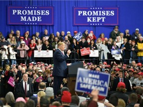 US President Donald Trump greets supporters at the Make America Great Again Rally on March 10, 2018 in Moon Township, Pennsylvania. President Trump travelled to Pennsylvania to speak at a " Make America Great Again " rally on behalf of Republican candidate Rick Saccone.