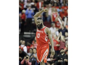 Houston Rockets' James Harden (13) celebrates with the crowd during the closing seconds of the second half of an NBA basketball game against the Los Angeles Clippers Thursday, March 15, 2018, in Houston. The Rockets won 101-96.