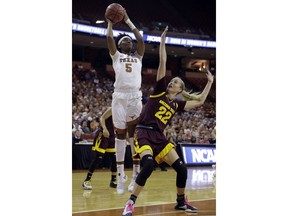 Texas forward Jordan Hosey (5) shoots over Arizona State guard Courtney Ekmark (22) during a second-round game in the NCAA women's college basketball tournament, Monday, March 19, 2018, in Austin, Texas.