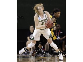 Baylor forward Lauren Cox (15) works to the basket against Grambling State guard Takerra Parsons, rear, in the first half of a first-round game at the NCAA women's college basketball tournament in Waco, Texas, Friday, March 16, 2018.
