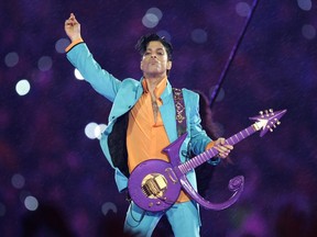 Prince performs during the halftime show at the Super Bowl XLI football game at Dolphin Stadium in Miami on Feb. 4, 2007.