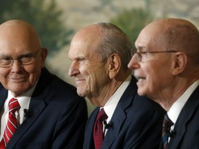 FILE - In this Jan. 16, 2018, file photo, shows President Russell M. Nelson, center, as his counselors Dallin H. Oaks, left and Henry B. Eyring, speaking during a news conference, in Salt Lake City. The Mormon church, announced Monday, March 26, 2018,  is making significant changes to its guidelines for how local leaders are supposed to handle reports of sexual abuse and one-on-one meetings with youth amid heightened scrutiny over sexual abuse from the #MeToo  movement and one week after a former prominent church missionary leader was accused of sexually assaulting two women in the 1980s.