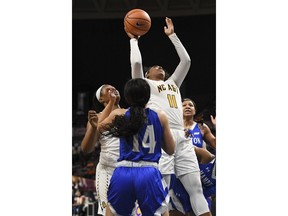 North Carolina A&T forward Jade Scaife goes up for a shot against Hampton during an NCAA college basketball game in the finals of the Mid-Eastern Athletic Conference tournament Saturday, March 10, 2018, in Norfolk, Va.