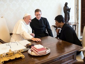 Youngest child of civil rights leaders Martin Luther King Jr. Bernice King, right, speaks with Pope Francis on the occasion of their private audience, at the Vatican, Monday, March 12, 2018.(L'Osservatore Romano/Pool Photo via AP)