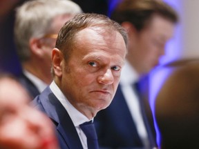 European Council President Donald Tusk attends a breakfast meeting at an EU summit in Brussels on Friday, March 23, 2018. Leaders from the 28 European Union nations meet for a second day of an EU summit to assess the state of Brexit negotiations and the prospect of a trade war with the United States.