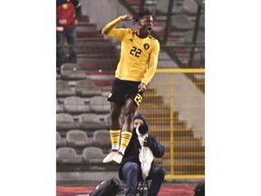 Belgium's Michy Batshuayi jubilates after scoring his sides third goal during an international friendly soccer match between Belgium and Saudi Arabia at King Baudouin stadium in Brussels on Tuesday, March 27, 2018.