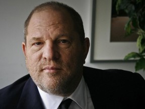 In this Nov. 23, 2011 file photo, film producer Harvey Weinstein poses for a photo in New York.