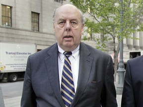 FILE - In this April 29, 20111, file photo, attorney John Dowd walks in New York. Dowd, President Donald Trump's lead lawyer in the Russia investigation has left the legal team, is confirming his decision in an email to The Associated Press. Dowd says he "loves the president" and wishes him well.
