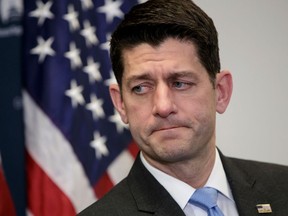 FILE - In this March 20,2018, file photo, House Speaker Paul Ryan of Wis., pauses as he speaks to reporters on Capitol Hill in Washington. Ryan's political future as House speaker has been such a topic of speculation that even the simple question of whether he will seek re-election to his Wisconsin seat remains secret.