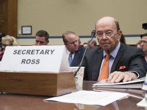 FILE - In this Oct. 12, 2017, file photo, Commerce Secretary Wilbur Ross appears before the House Committee on Oversight and Government Reform to discuss preparing for the 2020 Census, on Capitol Hill in Washington. The Commerce Department says the 2020 U.S. Census will include a question about citizenship status. Commerce says in a press release issued Monday night that the citizenship data will help the Justice Department enforce the Voting Rights Act, which protects minority voting rights. But opponents say the question will discourage immigrants from responding to the census.