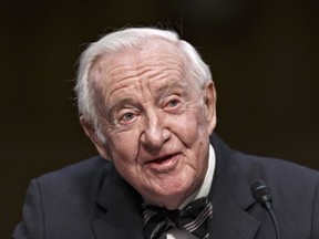 FILE - In this April 30, 2014, file photo, retired Supreme Court Justice John Paul Stevens testifies on the ever-increasing amount of money spent on elections as he appears before the Senate Rules Committee on Capitol Hill in Washington. Stevens is calling for the repeal of the Second Amendment to allow for significant gun control legislation. The 97-year-old Stevens says in an essay on The New York Times website that repeal would weaken the National Rifle Association's ability to "block constructive gun control legislation." (AP Photo)