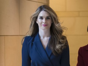 In this Feb. 27, 2018 photo, White House Communications Director Hope Hicks, one of President Trump's closest aides and advisers, arrives to meet behind closed doors with the House Intelligence Committee, at the Capitol in Washington. Hicks, one of President Donald Trump's most loyal aides, is resigning. In a statement, the president praises Hicks for her work over the last three years. He says he "will miss having her by my side." The news comes a day after Hicks was interviewed for nine hours by the panel investigating Russia interference in the 2016 election and contact between Trump's campaign and Russia.