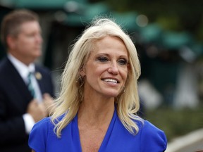 FILE - In this July 27, 2017, file photo, Counselor to the President Kellyanne Conway walks back to the West Wing of the White House in Washington. A federal watchdog says Conway violated the federal law prohibiting government officials from using their positions to influence political campaigns. The Office of Special Counsel says Conway violated the Hatch Act twice last year when she advocated for embattled Alabama GOP Senate candidate Roy Moore and against his Democratic rival, Sen. Doug Jones.