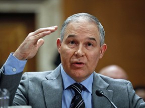 FILE - In this Jan. 30, 2018, file photo, Environmental Protection Agency administrator Scott Pruitt testifies before the Senate Environment Committee on Capitol Hill in Washington. Pruitt spent more than $120,000 in public funds last summer for a trip to Italy that included a meeting of G-7 ministers and a private tour of the Vatican.