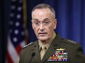 FILE - In this Oct. 23, 2017, file photo Joint Chiefs Chairman Gen. Joseph Dunford speaks to reporters at the Pentagon. Afghan security forces have identified key areas of the country that must be secure for the elections later this year and have planned a series of military operations to free them from Taliban control, Dunford said Wednesday, March 21, 2018.