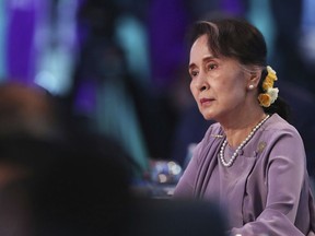 FILE - In this March 18, 2018, file photo, Myanmar leader Aung San Suu Kyi listens to the opening speech at the Leaders Plenary during ASEAN-Australia Special Summit in Sydney, Australia. The Trump administration has slapped sanctions on companies across the globe to punish illicit trade with nuclear-armed North Korea, yet Myanmar, which is suspected of acquiring ballistic missile systems from the pariah state, has escaped the full force of the "maximum pressure" campaign.