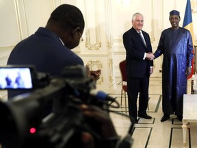 Chad's President Idriss Deby welcomes U.S. Secretary of State Rex Tillerson at the Presidential Palace in N'Djamena, Chad, Monday, March 12, 2018.