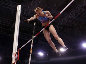 Russia's Olga Mullina makes an attempt in the women's pole vault final at the World Athletics Indoor Championships in Birmingham, Britain, Saturday, March 3, 2018.